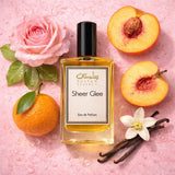 Sultan Essancy Sheer Glee perfume bottle with peach, rose, orange, vanilla bean, and flower on a pink background
