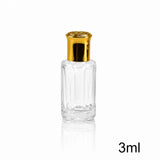 Dehn Al Oud Kalimantan by Al Haramain smoky oud perfume oil in a 3 ml clear glass attar bottle with a gold cap