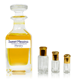 Sweet Messina by Sultan Essancy, a Cool Water-inspired fresh aquatic perfume oil for men with mint, lavender and marine notes, displayed with gold-capped attar bottles